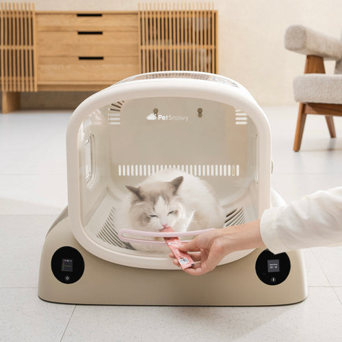 a ragdoll cat inside SMILE pet dryer box